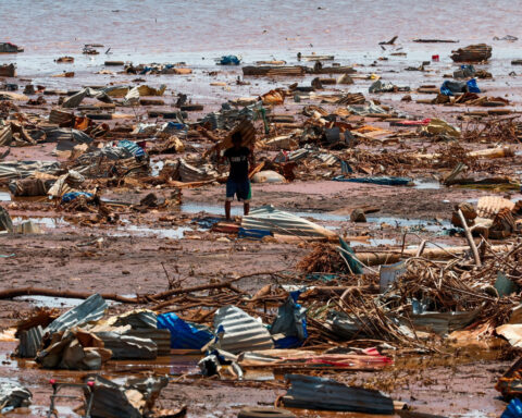 Macron swears in angry exchange with residents of cyclone-hit Mayotte