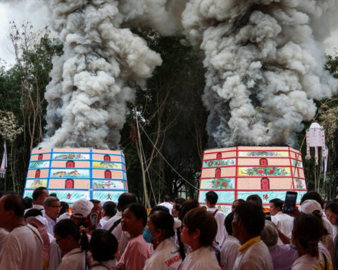 Thai ceremony for the dead brings good karma and emotional closure