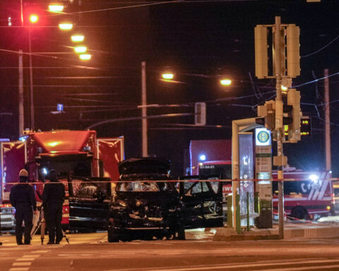 At least 2 dead and 60 hurt after a car drives into a German Christmas market in a suspected attack