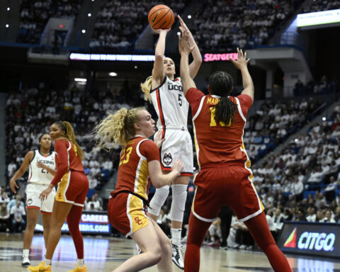 JuJu Watkins and No. 7 USC hold off Paige Bueckers and fourth-ranked UConn 72-70