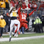 Howard throws 2 TD passes to Smith to help Ohio State rout Tennessee 42-17 in CFP