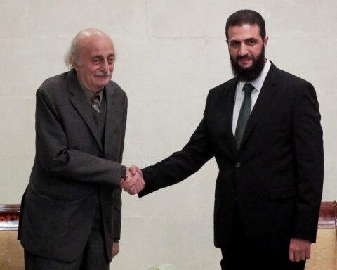 Syria's de facto ruler reassures minorities, meets Lebanese Druze leader