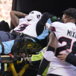 Texans WR Tank Dell released from hospital, headed back to Houston after severe knee injury