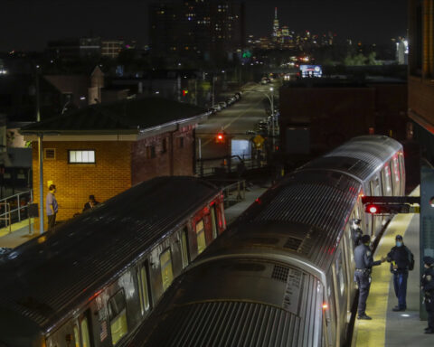 New York City police apprehend suspect in the death of a woman found on fire in a subway car