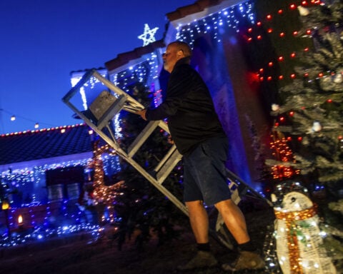 Elaborate holiday light displays are making spirits bright in a big way