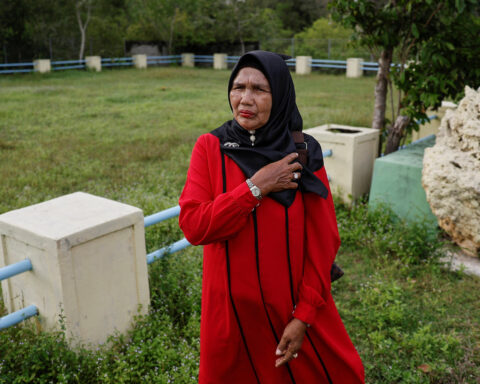 Indonesian tsunami survivor holds on to hope for missing son after 20 years