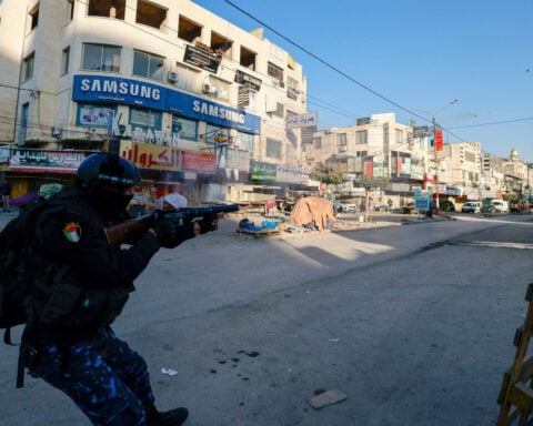 A new front in the Middle East: Militants battle Palestinian Authority in sprawling refugee camp