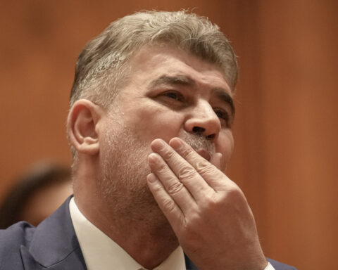 Romanian lawmakers narrowly approve new pro-European coalition during period of political turmoil