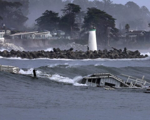 California residents on edge as high surf and flooding threats persist on Christmas Eve