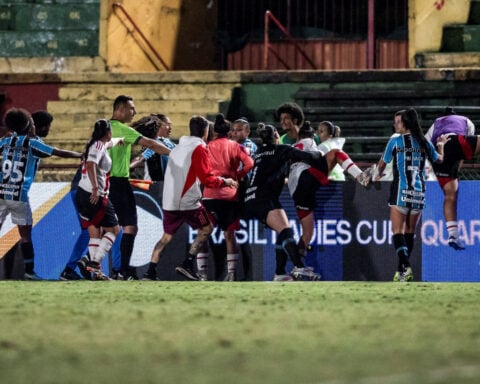 Soccer-Argentine players detained in Brazil after alleged racist incident