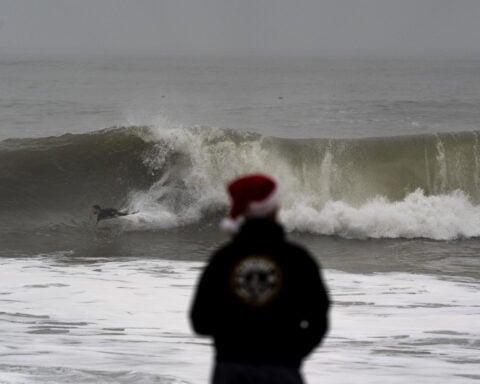 California residents on edge as high surf and flooding threats persist on Christmas Eve