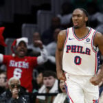 Embiid shakes off pregame fall, leads Sixers to 118-114 win over Celtics