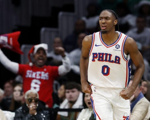 Embiid shakes off pregame fall, leads Sixers to 118-114 win over Celtics