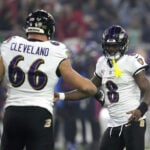 Lamar Jackson breaks NFL QB rushing record, accounts for 3 TDs in Ravens' 31-2 romp over Texans