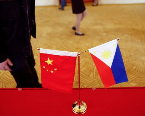 China urges Philippines to return to 'peaceful development'