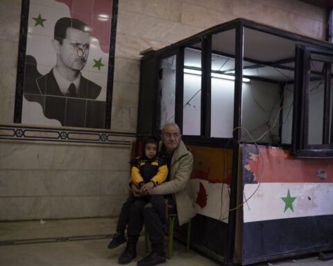 An uneasy calm settles over Syrian city of Homs after outbreak of sectarian violence