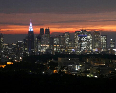 Japan's cabinet approves record $730 billion budget for next fiscal year