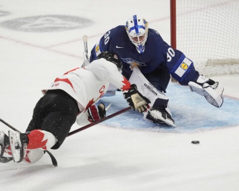 Cole Hutson has 5 assists, defending champion US routs Germany 10-4 in world junior hockey opener