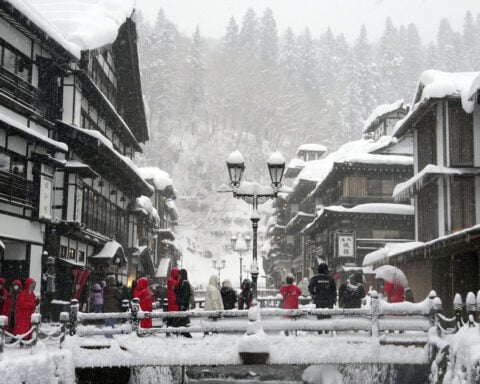 Japan’s scenic hot springs town restricting tourists amid fights over the best photo spots