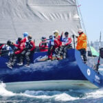 2 sailor deaths result in muted celebrations on winning yacht in Sydney to Hobart race