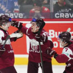 Latvia stuns Canada in world junior hockey, winning 3-2 on lone shootout goal