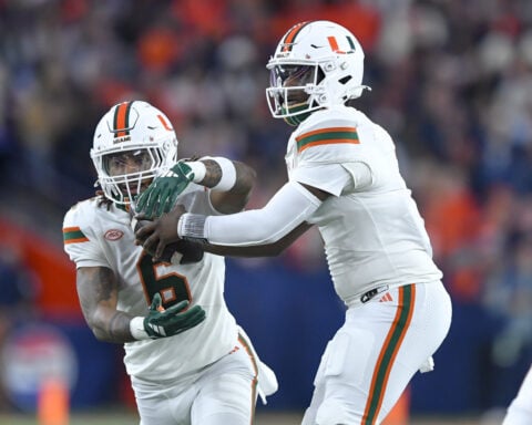 Miami's Cam Ward sets NCAA's Division I record with 156th career touchdown pass