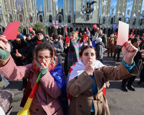 New Georgian president sworn in, as pro-EU predecessor says she takes ‘legitimacy’ with her