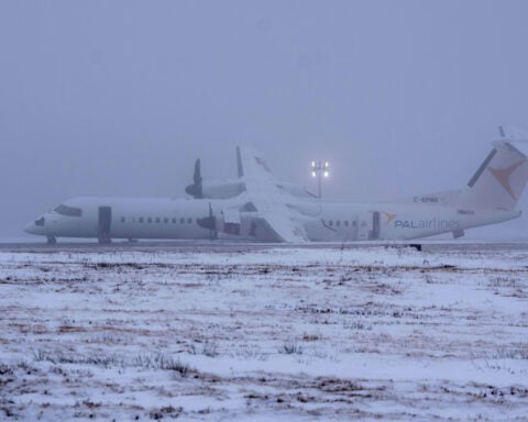 Passengers report flames as Air Canada flight suffers ‘suspected landing gear issue’ after landing