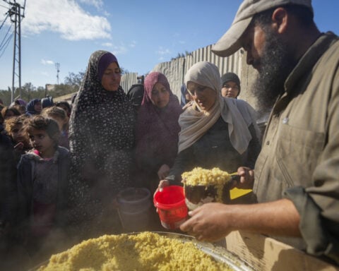 In Gaza's crowded tent camps, women wrestle with a life stripped of privacy