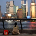 China urges more aid for people in need as economic woes persist