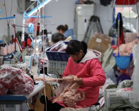 China Dec factory activity expands at slower pace as trade risks rise