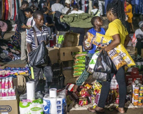 Zimbabwe's new currency woes hit traditional stores while illegal night bazaars flourish