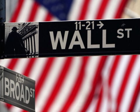 Wall Street ends lower, capping a banner year