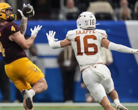 Texas avoids huge upset, beats Arizona State 39-31 in double overtime at Peach Bowl