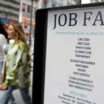 US weekly jobless claims slide to eight-month low