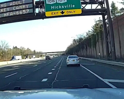 Long Island police officer finds missing man with dementia driving under highway sign displaying Silver Alert