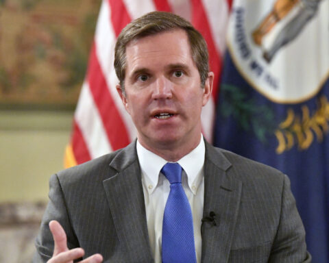 Kentucky Gov. Andy Beshear laughs off unflattering social media comments in a video with his wife