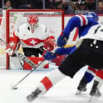 BC teammates Hagens, Leonard each score twice, US routs Switzerland 7-2 in world junior quarterfinal