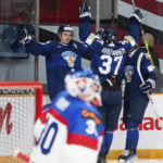 BC teammates Hagens, Leonard each score twice, US routs Switzerland 7-2 in world junior quarterfinal