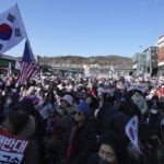 South Korea's impeached president defies warrant in hourslong standoff