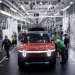 EV maker Rivian beats expectations for deliveries as supply snag eases