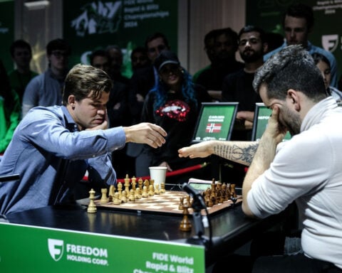 Magnus Carlsen and Ian Nepomniachtchi agree to share chess’ World Blitz Championship title, causing outcry from top players