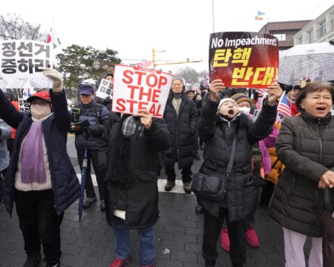 South Korean anti-corruption agency asks police to take over efforts to detain impeached Yoon