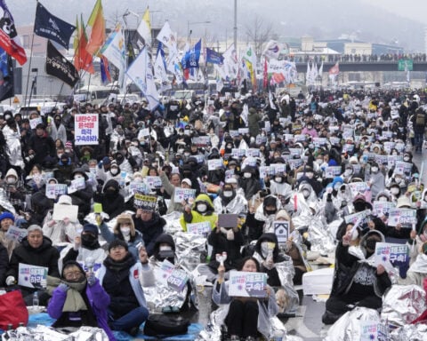 South Korean anti-corruption agency asks police to take over efforts to detain impeached Yoon