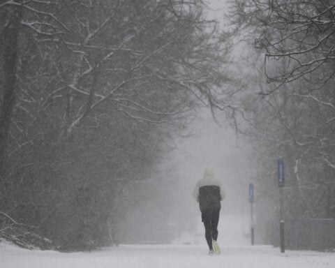 Winter blast of snow, ice and bitter cold grips the US from the Midwest to the East Coast