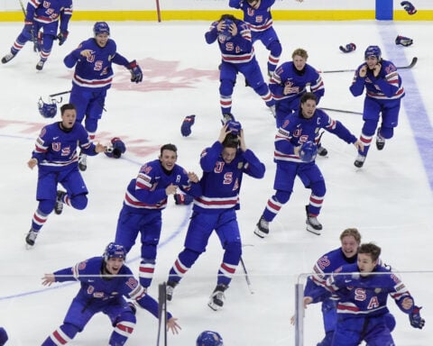 BC's Stiga scores on OT breakaway to give US 2nd straight world junior title, 4-3 over Finland