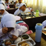 Indonesia dishes out first free meals in programme targeting 83 million people