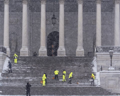The Latest: Snow, ice and frigid temperatures make for a dangerous winter mix