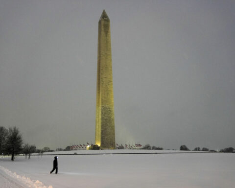 Can Washington handle two weeks of high-security pomp along with a heavy burst of snow?