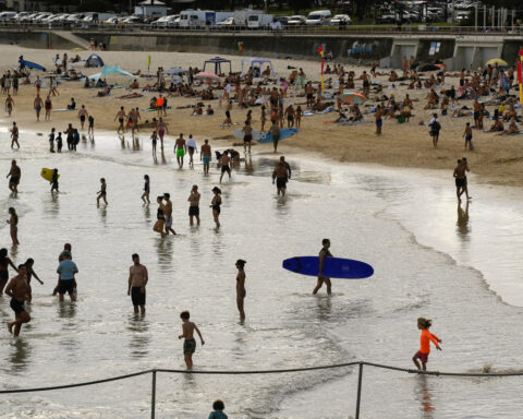 Australia's prime minister wades in to debate over beach cabanas